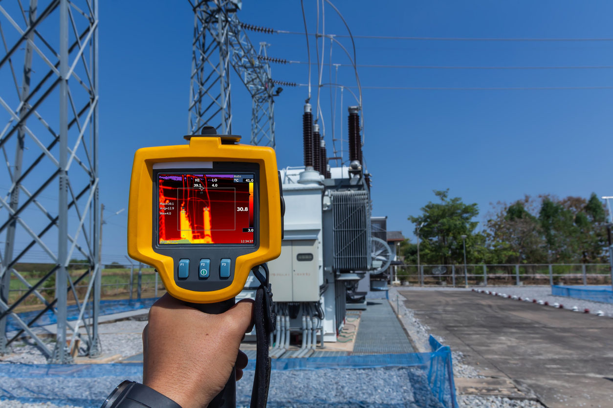 Thermal imaging device pointed at an power kiosk | Maintainly CMMS