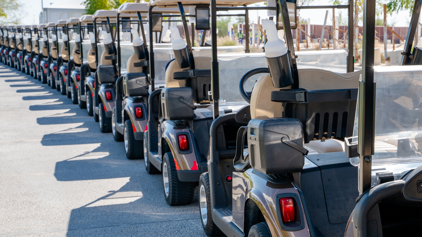 Fleet of golf carts lined up | Maintenance