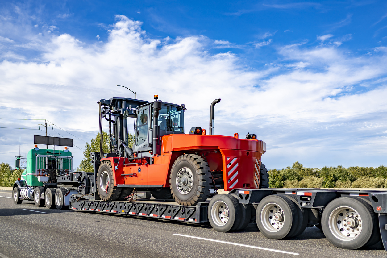 Vehicle vehicle is transported on the back of a truck | CMMS