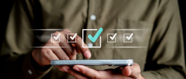 Checklists being completed on a mobile device | Maintainly CMMS