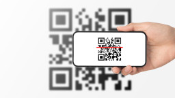 QR code on a mobile device scanning an inventory QR code | CMMS
