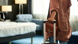 Guest arrives in hotel room with luggage | Hotel Maintenance