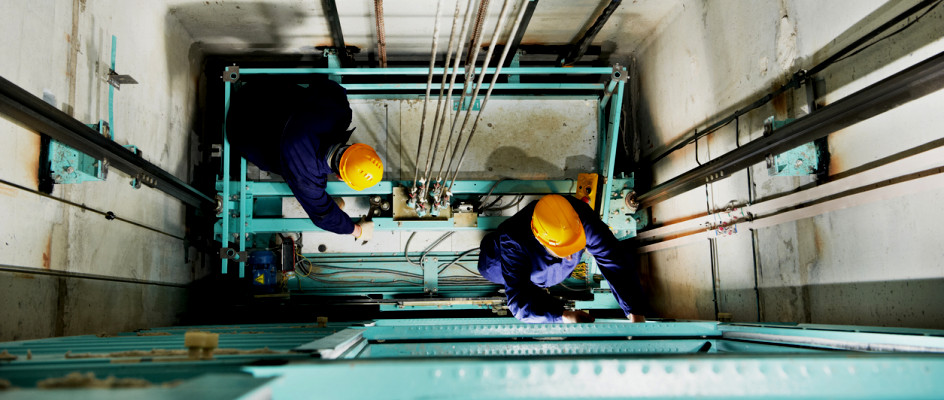 Maintenance | Workers perform maintenance on a lift