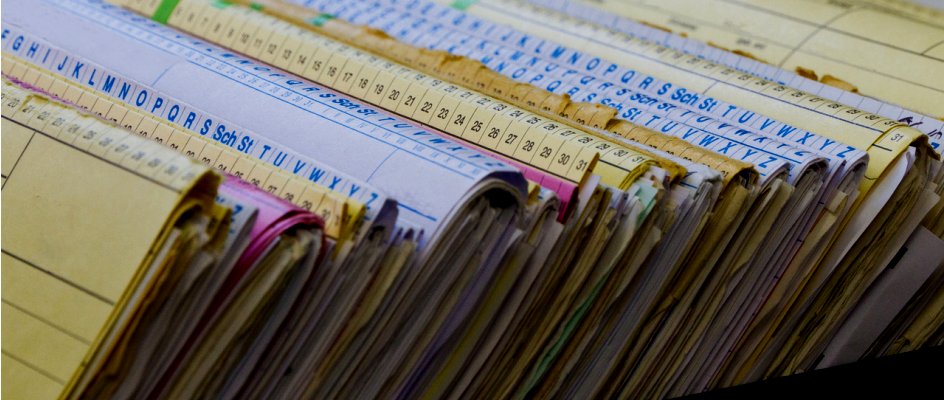 Close up view of paper-based maintenance records | CMMS