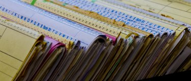 Close up view of paper-based maintenance records | CMMS