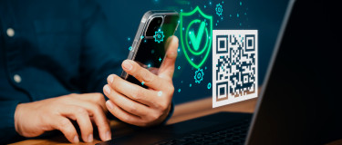 QR label with mobile phone and laptop computer | Maintainly