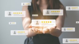 Women surrounded by maintenance software review cards | Maintainly