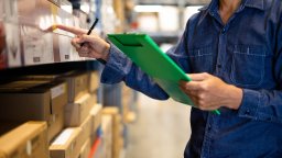 Warehouse worker performs inventory cycle count | CMMS
