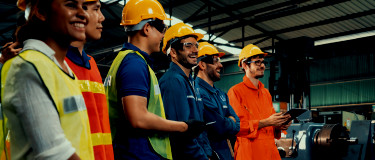 Maintenance workers in meetings and laughing | CMMS